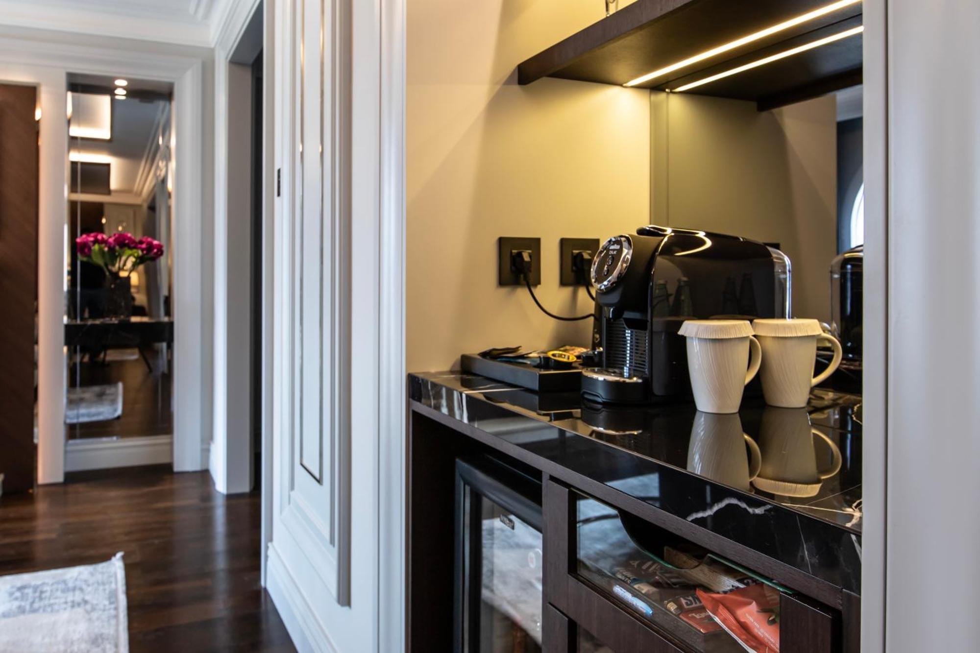Xheko Imperial Luxury Hotel & Spa Тирана Екстер'єр фото A Nespresso machine in a hotel room