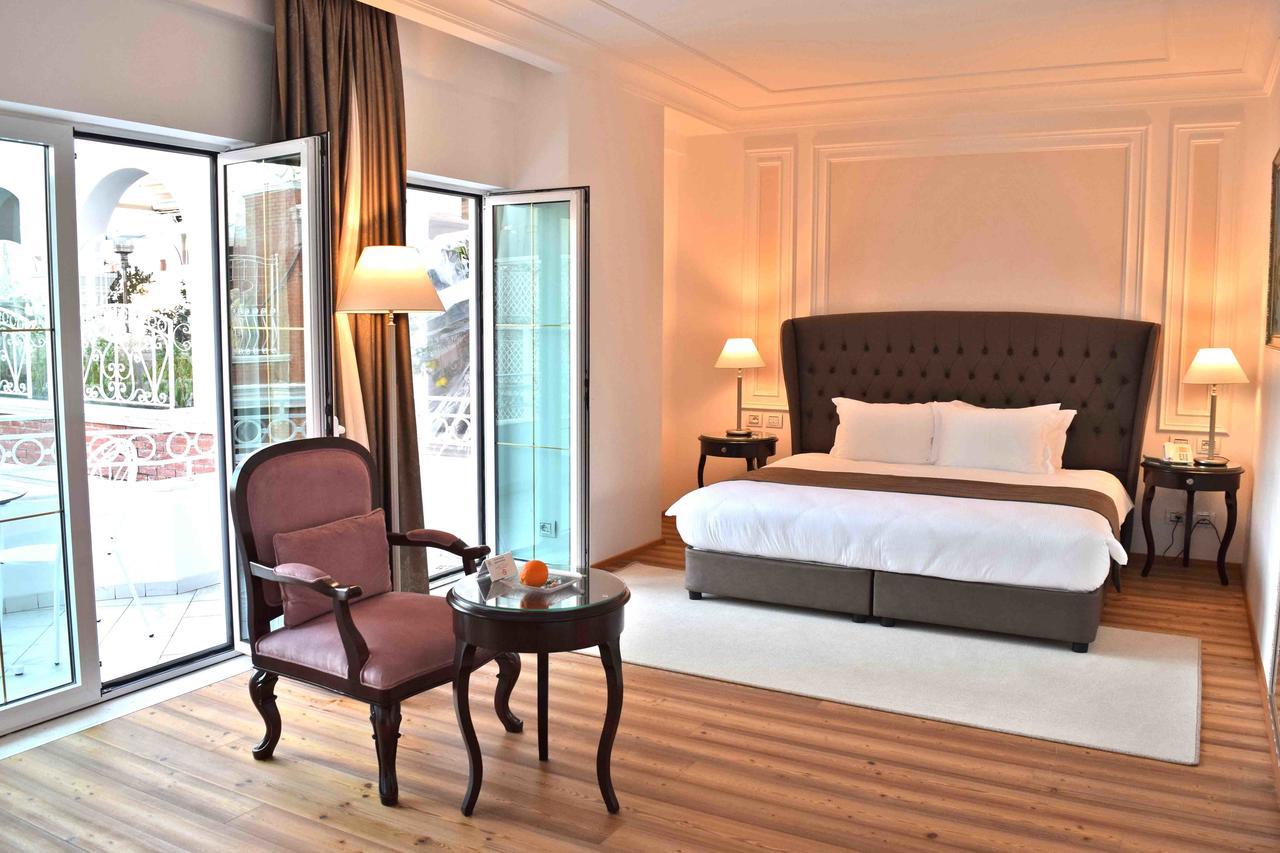 Xheko Imperial Luxury Hotel & Spa Тирана Екстер'єр фото A bedroom at the hotel