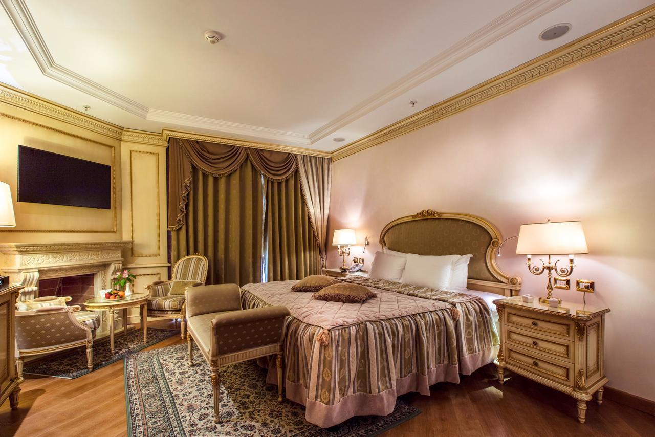 Xheko Imperial Luxury Hotel & Spa Тирана Екстер'єр фото A bedroom at the hotel